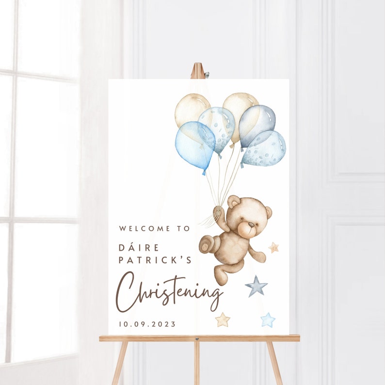 Christening Welcome Sign with bear holding blue and brown balloons, portrait orientation, shown on easel