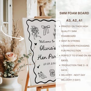 May include: A white foam board sign with black line art and text. The sign says "Welcome to Olivia's Hen Party" with the date 27.07.2025. The sign includes illustrations of a bouquet, bow, champagne glasses, hearts, shoes, and a ring. The sign is displayed on a wooden easel.