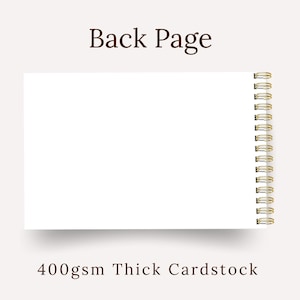 May include: A white notepad with a gold spiral binding. The words "Back Page" are printed in brown at the top, and "400gsm Thick Cardstock" is printed at the bottom. The notepad is on a light beige background.
