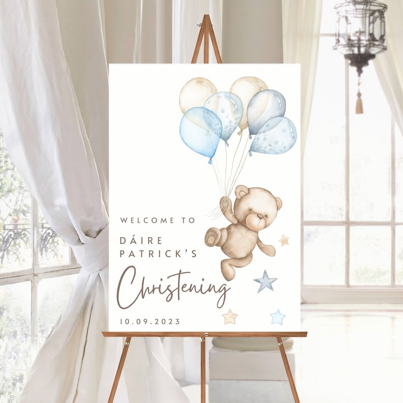 May include: Welcome to D&aacute;ire Patrick's Christening on 10.09.2023. A watercolor illustration of a teddy bear holding blue and beige balloons with stars in the background.