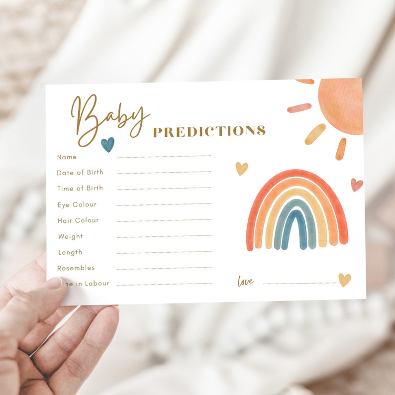 May include: A baby shower prediction card with gold script text reading "Baby Predictions". The card has a watercolour rainbow, sun, and hearts in orange, yellow, and blue. Includes prompts for baby's details, such as name and eye colour.