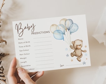 May include: A baby shower game card with a blue and brown teddy bear holding balloons. The card has a list of predictions for the baby, including name, date of birth, time of birth, eye color, hair color, weight, length, and who the baby resembles.