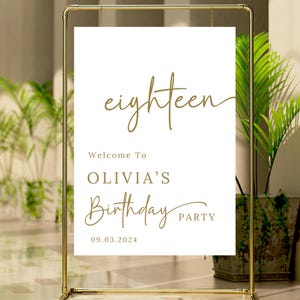 May include: White welcome sign with gold text that reads "eighteen" and "Welcome to Olivia's Birthday Party 09.03.2024".