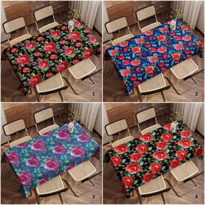 May include: Four rectangular tablecloths with floral rose patterns are displayed. The tablecloths feature red roses on black, blue, and teal backgrounds. Each tablecloth is draped over a table with four chairs.