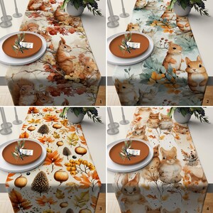 May include: Four different table runners with a fall theme. Each runner features a different pattern of leaves, acorns, and squirrels. The runners are all on a white background.