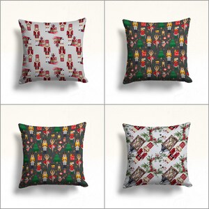 May include: Four decorative throw pillow covers featuring a repeating pattern of nutcracker soldiers and ballerinas. The patterns are on white, gray, and light gray backgrounds.