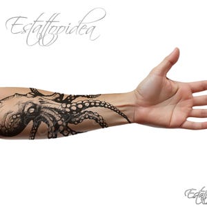 May include: A black and white tattoo design of an octopus on a person's arm. The octopus is drawn in a realistic style with detailed tentacles and suckers.