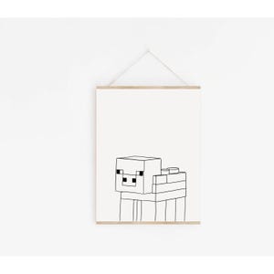 May include: Black and white line art print of a pixelated sheep. The artwork is displayed on a white background and framed with a wooden hanger. The sheep is constructed from geometric shapes.