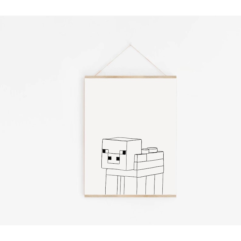 May include: Black and white line art print of a pixelated sheep. The artwork is displayed on a white background and framed with a wooden hanger. The sheep is constructed from geometric shapes.
