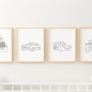 May include: Four black and white line art prints of cars from the Disney Pixar movie Cars. The prints are framed in simple wooden frames and are displayed on a white wall.