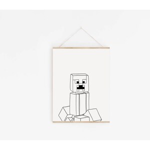May include: Black and white line art print of a Minecraft Creeper character. The artwork features the Creeper's blocky head and body, with geometric shapes forming its limbs and the ground it sits on. The print is mounted on a wooden frame.