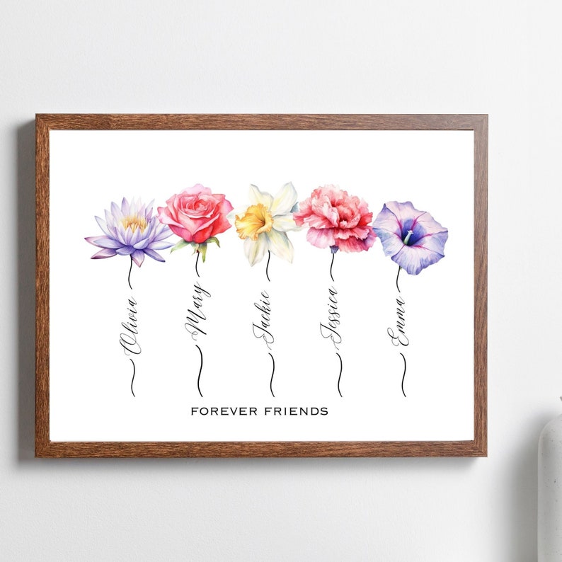 Puede incluir: Una impresi&oacute;n enmarcada con flores de acuarela y los nombres: Olivia, Mary, Jackie, Jessica y Emma. La frase "Forever Friends" est&aacute; debajo de las flores. El marco es de color marr&oacute;n oscuro.