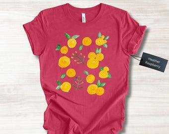 Camisa floral para mujer, diseño bohemio de flores amarillas, unisex, de Bella + Canvas, 10 colores disponibles, tallas grandes disponibles.