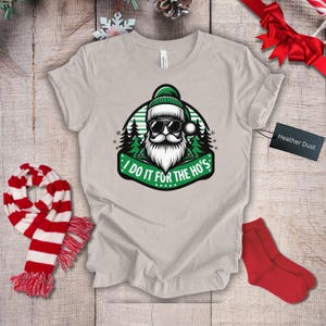 Funny Santa Christmas Shirt, I do it for the Hos, Holiday Graphic Tee, Unisex Santa Claus Top, Christmas Humor T-Shirt, Festive Xmas