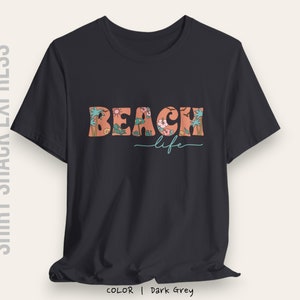 Retro font decorated with beach accents that says Beach life on a t-shirt