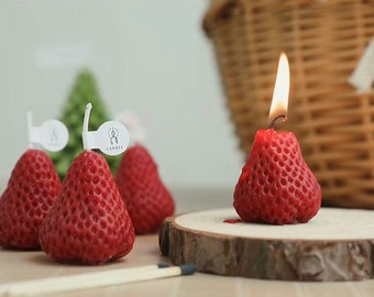 Strawberry shape scented candle