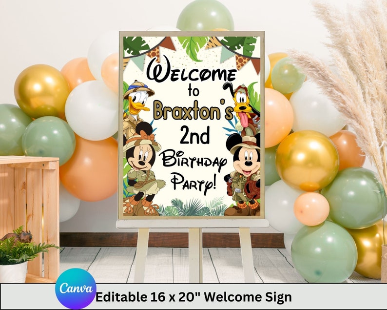 May include: Welcome sign for a 2nd birthday party featuring Mickey Mouse and Donald Duck dressed in safari outfits. The sign is decorated with green leaves, animal print, and the text "Welcome to Braxton's 2nd Birthday Party!"