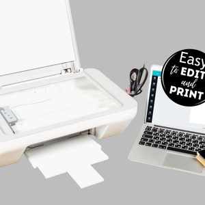 May include: A white all-in-one printer with the lid open, a laptop computer with a design program open on the screen, and a cell phone. The laptop screen has a black circle with the text "Easy to EDIT and PRINT".