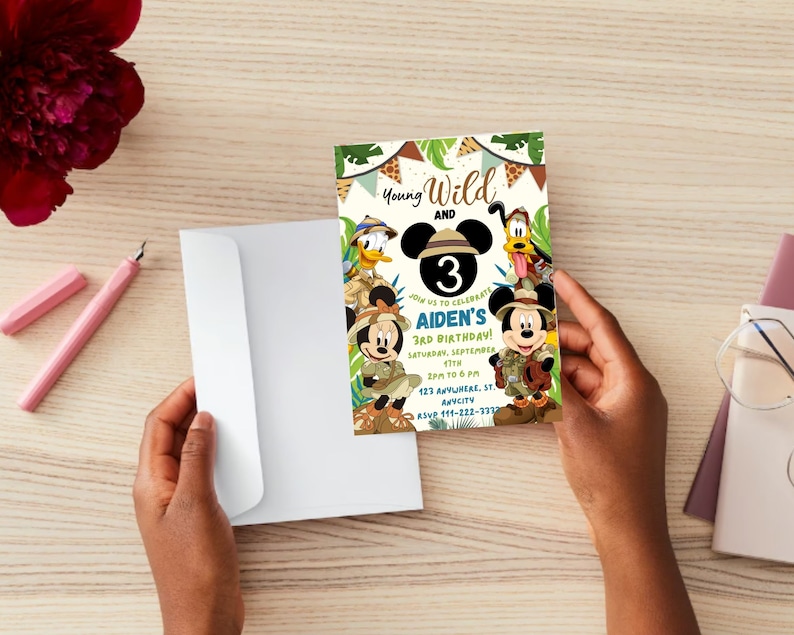 May include: A colorful invitation card with a jungle theme featuring Mickey Mouse, Minnie Mouse, Donald Duck, and Goofy. The card says "Young Wild and" with a large number "3" and "Aiden's 3rd Birthday!" The card also includes the date, time, and location of the party.