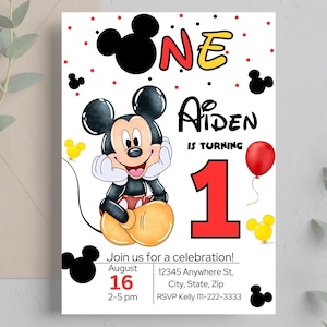 May include: A birthday invitation featuring Mickey Mouse. The invitation is for Aiden's first birthday party. The invitation is decorated with red, yellow, and black Mickey Mouse ears and a red balloon. The text on the invitation reads "One Aiden is turning 1. Join us for a celebration! August 16, 2-5 pm. 12345 Anywhere St, City, State, Zip. RSVP Kelly 111-222-3333."