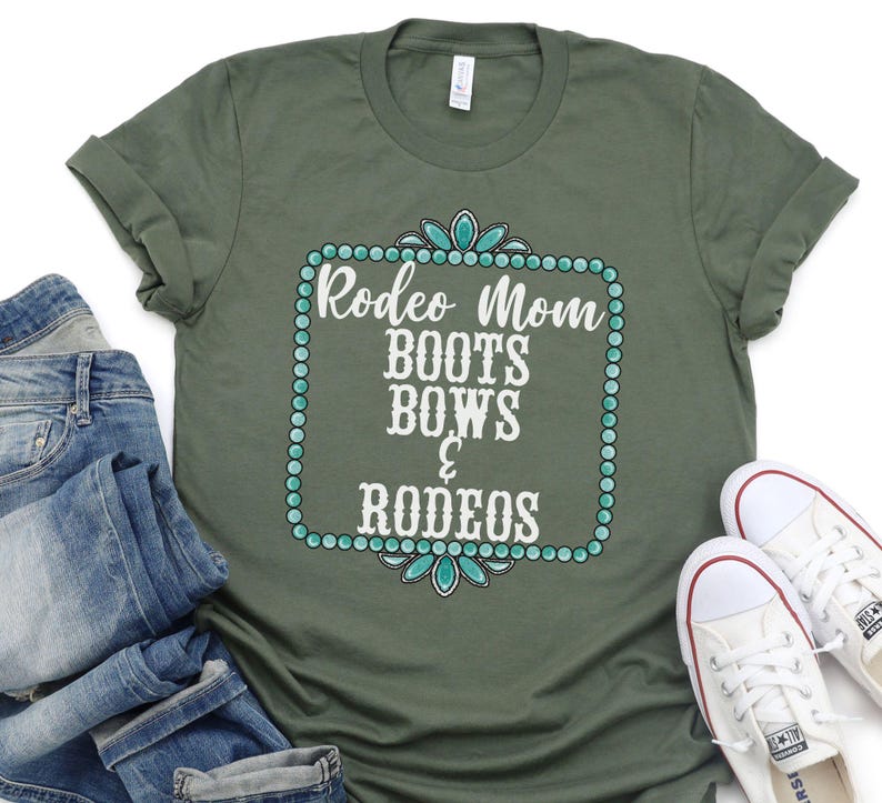 May include: Green t-shirt with a white graphic that says "Rodeo Mom Boots Bows & Rodeos" surrounded by turquoise jewels.