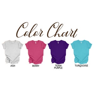 May include: Color chart showing four t-shirt colors: ash, berry, team purple, and turquoise.