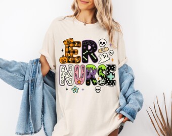 ER Nurse Halloween Shirt - Spooky RN Tee with Skulls, Syringes, and Ghosts - Fun Emergency Room Nurse Costume or October Shift Outfit