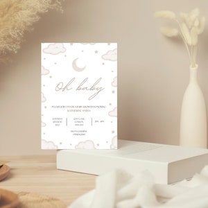 May include: A baby shower invitation with a light blue background and white clouds and stars. The text reads "Oh baby" and includes the date, time, and location of the event.