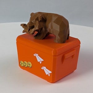 Mr. Grizz y la caja de huevos naranja, artículo de fan inspirado en Splatoon