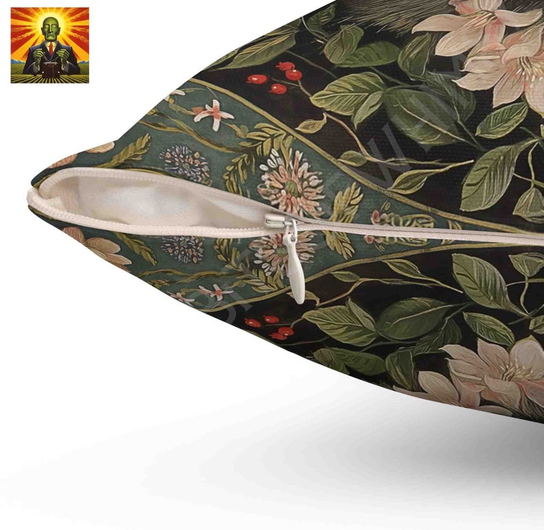 May include: A square throw pillow cover featuring a dark black background with a botanical pattern of light pink flowers, green leaves, and small red berries. The fabric has a white zipper closure along the side with a white metal pull tab.