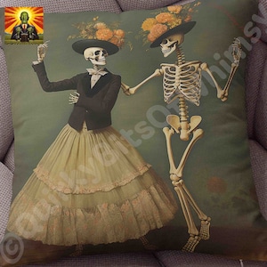 May include: Two skeletons dressed in formal attire, one in a black suit and a white skirt, the other in a black suit and pants, dance against a green background. The skeletons are wearing floral headbands and hats.