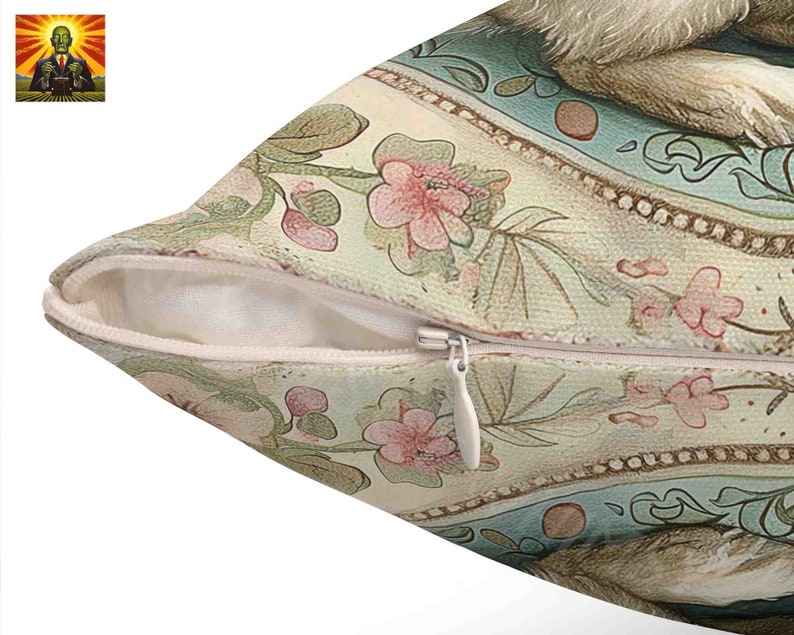 May include: A cream-colored pillow with a zipper closure. The pillow features a floral pattern with pink, green, and blue accents. The pattern includes stylized flowers, leaves, and vines. The pillow has a vintage aesthetic.
