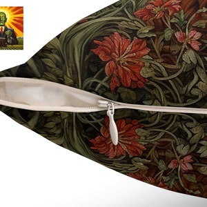 May include: A throw pillow with a zipper closure features a dark green, brown, and red floral pattern. The pattern includes stylized flowers and leaves.
