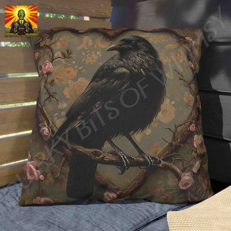 May include: A black crow perched on a branch with pink roses and green leaves. The crow is in a heart-shaped frame with a vintage floral background.