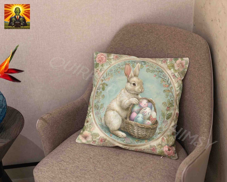 May include: A white bunny with pink ears sits in a wicker basket filled with colorful Easter eggs. The bunny is surrounded by floral designs and a blue background. The image is on a throw pillow.