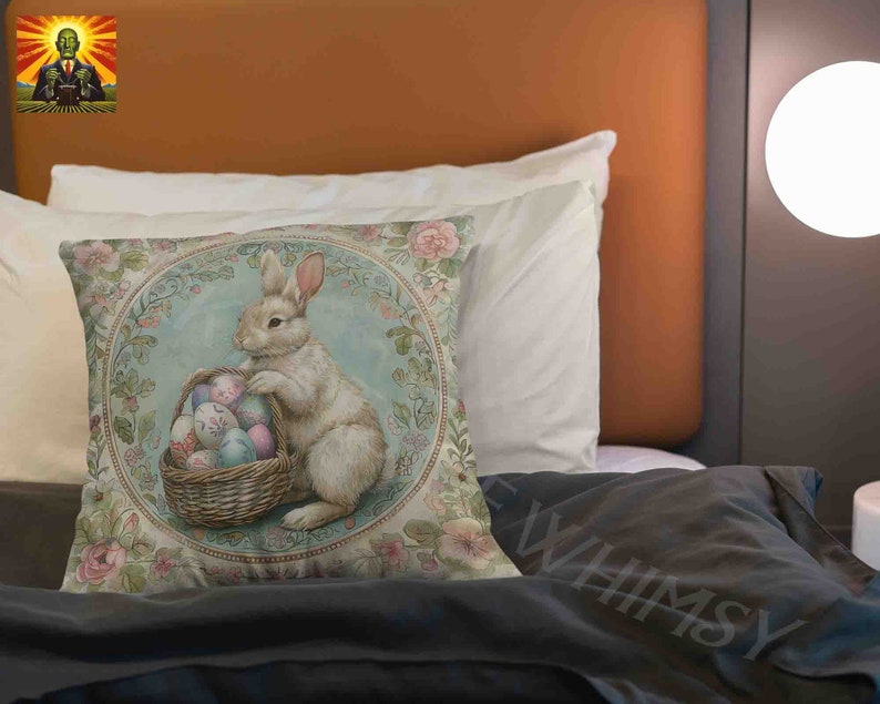 May include: A decorative pillow featuring a white rabbit holding a basket of colorful Easter eggs. The pillow has a floral design with a blue and green background.
