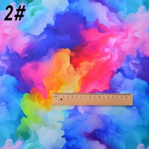 May include: Abstract colorful fabric with a rainbow of colors, including blue, purple, pink, orange, yellow, and green. The fabric has a marbled or swirled pattern.
