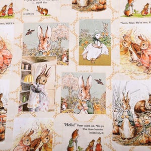 May include: Fabric with a cream background, showcasing illustrations of rabbits, ducks, and text from a children's story. The illustrations are in pastel colours, with a repeating pattern of framed scenes and floral accents.