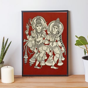 May include: A framed black and white illustration of a Hindu deity couple, Shiva and Parvati, dancing on a red background. The illustration is done in a traditional Indian style.