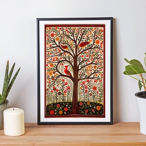May include: A framed print of a folk art style tree with red, orange, and yellow flowers and birds. The tree is on a white background with a red border.