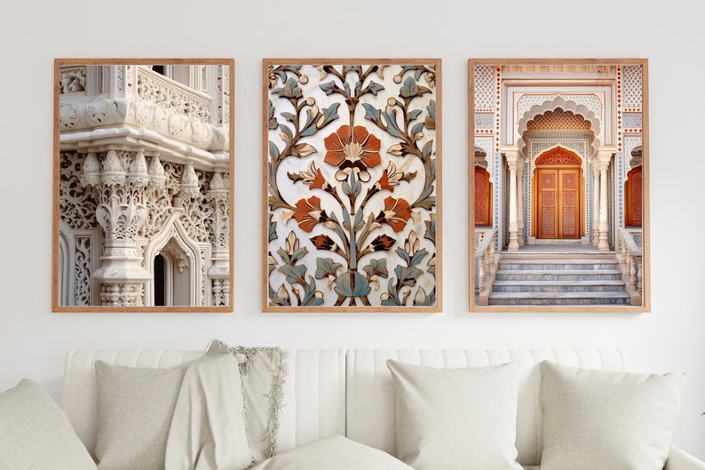 May include: Three framed prints depicting intricate architectural details from a mosque. The first print shows a close-up of a white, intricately carved archway. The second print features a floral pattern in shades of blue, white, and orange. The third print shows a doorway with a carved wooden door and a set of steps leading up to it.