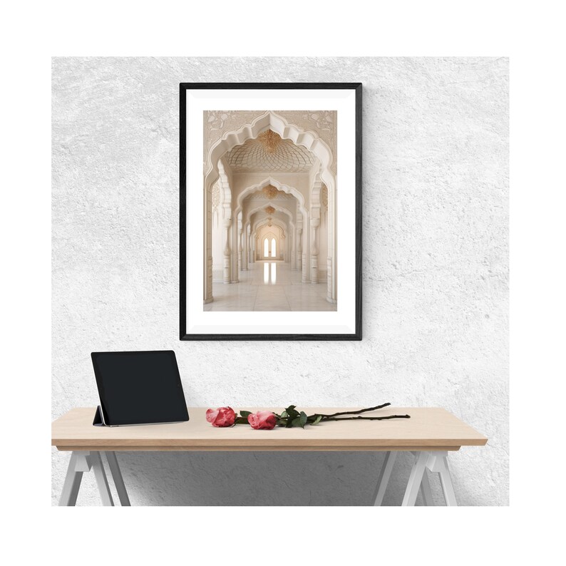 May include: A framed photograph of a white hallway with arched doorways and a chandelier hanging from the ceiling. The hallway is lined with white columns and the floor is tiled.