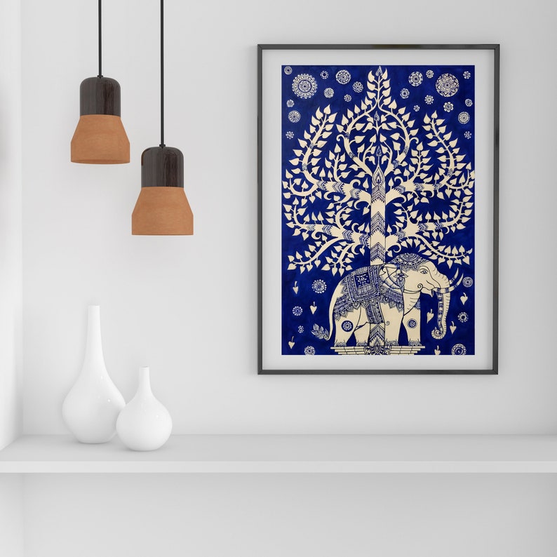 May include: A white elephant with intricate details stands under a white tree with a blue background. The tree has a large canopy and is surrounded by small white flowers. The image is framed in black.