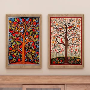 May include: Two framed paintings of stylized trees with colorful leaves and birds. The tree on the left has a dark background and the tree on the right has a light background.