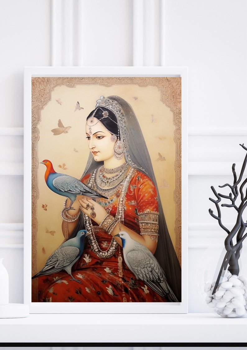 Puede incluir: Una pintura de una mujer con un sari rojo y dorado, que lleva un velo y joyas. Est&aacute; sosteniendo un p&aacute;jaro azul y rojo en sus manos, y otros dos p&aacute;jaros est&aacute;n posados en sus brazos. El fondo es de color marr&oacute;n claro con un dise&ntilde;o floral.