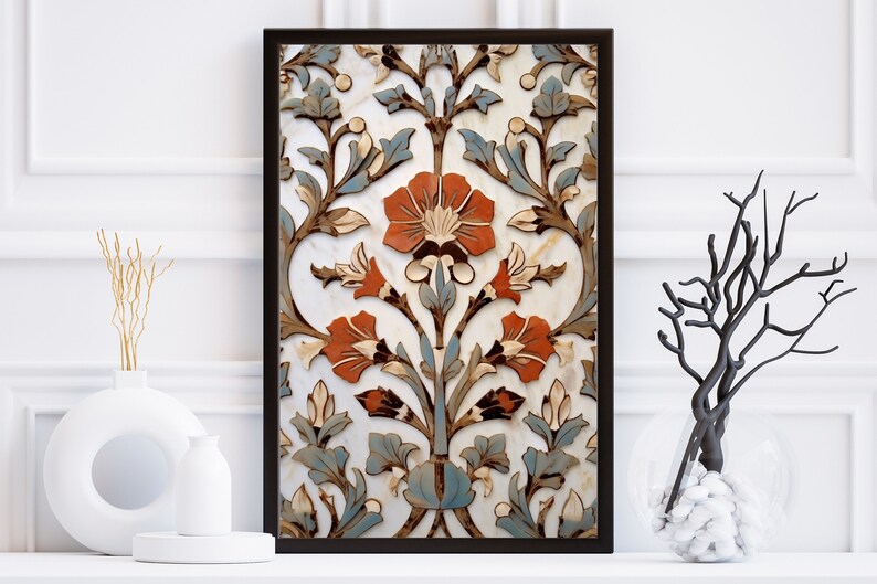 May include: A framed print of a traditional floral pattern in shades of blue, brown, and orange on a white background. The pattern features intricate details and a symmetrical design.