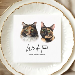 two cats on a white plate with gold trim, accompanied by the text "We do too! Love: Bane & Beans".