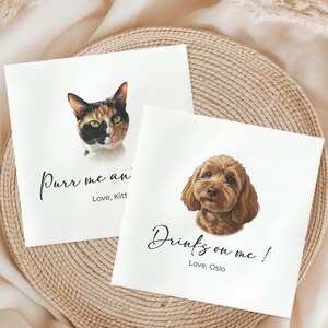 two square cards with illustrations of a cat and a dog, along with the text "Drinks on me!" written on them.