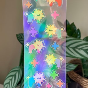 Foglio di adesivi - Leoni stella arcobaleno / olografico iridescente