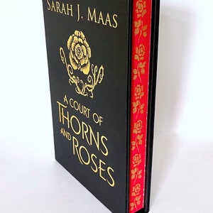 Collectors edition of A Court Of Thorns And Roses ACOTAR Custom sprayed edges